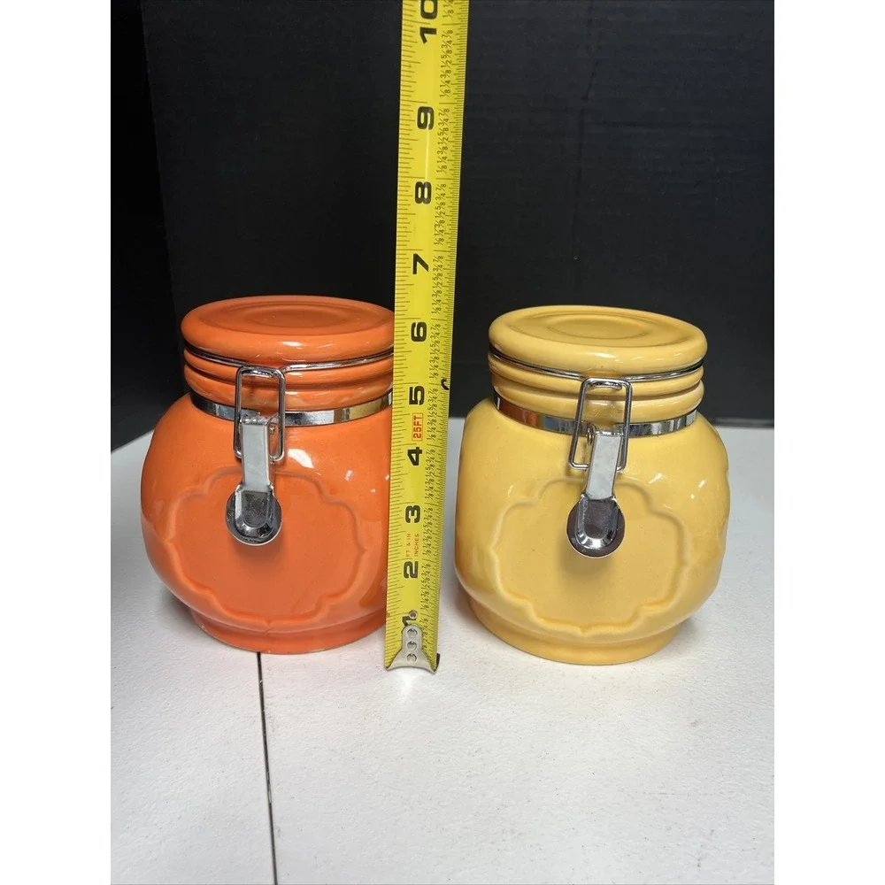 Set Of 2 Orange And Yellow Ceramic Jars With Locking Lids